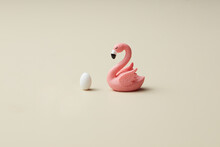 Figure Of Pink Easter Flamingo With White Egg