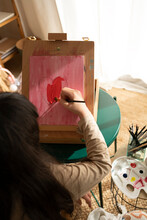 Girl Painting Red Heart To Give To Mom At Home