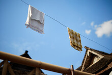 Towels Hanging Under Blue Sky In Xishuangbanna, Yunnan, China.