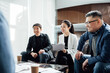 © ZQZ Studio/Stocksy - Business people working in office