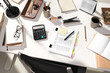 © Martí Sans/Stocksy - Work desk with documents calculator and office tools