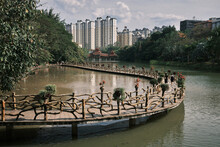Scenic Boardwalk In A Temple Garden In Xishuangbanna, Yunnan, China.