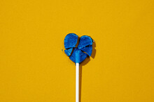 Broken Heart-shaped Lollipop On Fabric, As The Ukrainian Flag