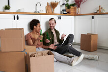 Young Couple Moving To New Flat With Fragile Things