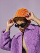 © ohlamour studio/Stocksy - Cool pose from a fashionable young men that feels his colourful outfit