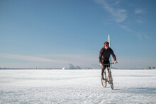 The Rider On A Bicycle Rides On Ice