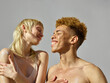 © ohlamour studio/Stocksy - Loving and caring for each other - natural body and hair - nude - sun