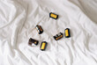 © Olga Moreira/Stocksy - Rolls of film on bed sheet