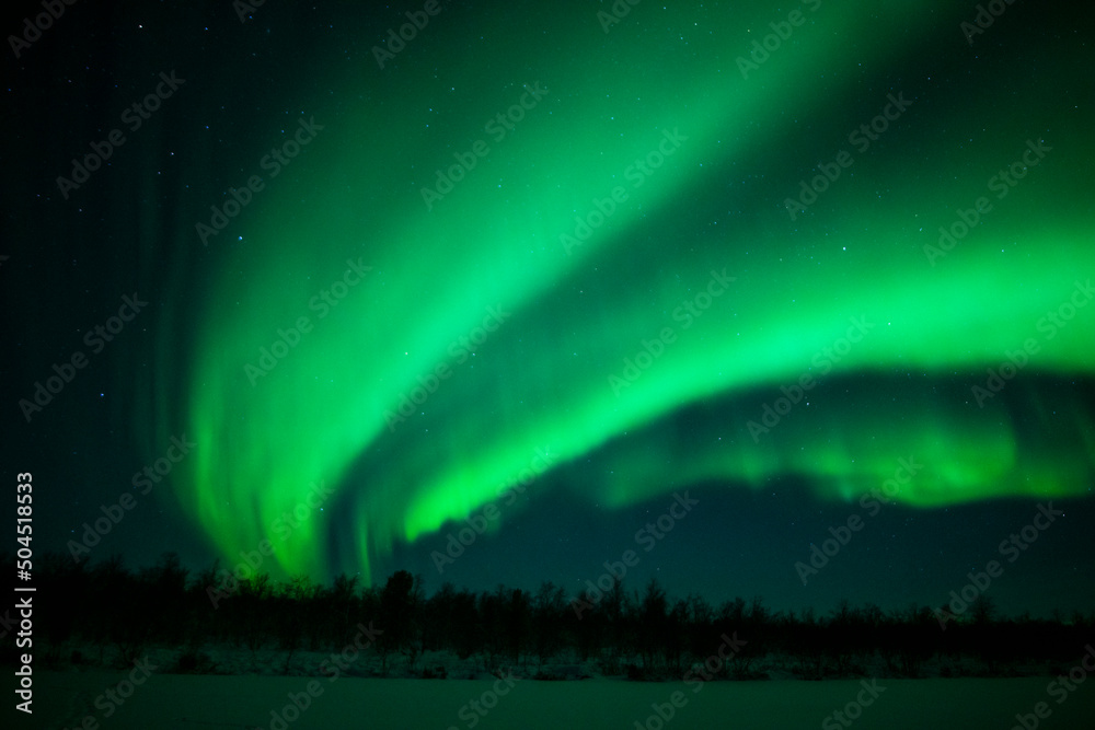 Northern Lights Creates a Display of Light and Color On the Starry Sky ...