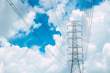 Electric Pole power line against blue sky, electricity post high voltage tower power transport to city urban area