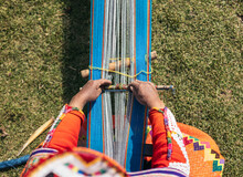 Close Up Of The Weaving Process In Peru