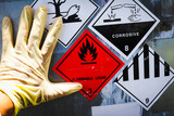 Fototapeta Maki - Warning symbol for chemical hazard on chemical container