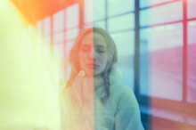 Portrait Of A Blond Girl With Big Windows And Rainbow Colours 