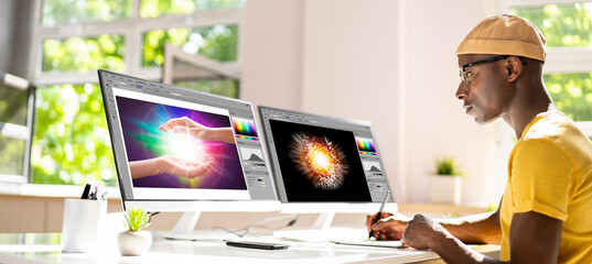 Poster - Designer Man Working On Computer In The Office