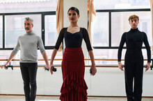 Three Flamenco Dancers Rehearsing With Castanetas 