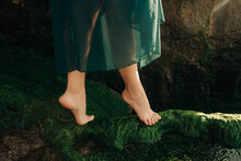 Female Feet On Moss