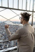 Guy Is Admiring Manhattan's Panorama From High Viewpoint