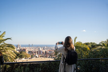 Tourist In Park Guell In Barcelona