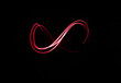 Infinity sign, light drawing, photo. Pink on black.