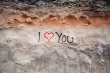 The Phrase "i Love You" On A Wall.