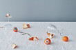 © Clique Images/Stocksy - Rotten Tangerines And Glassware On Table