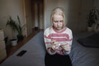 © Evgenij Yulkin/Stocksy - Teen girl with broken finger