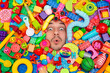 © Studio Peace - A man's face surrounded by building blocks and toys