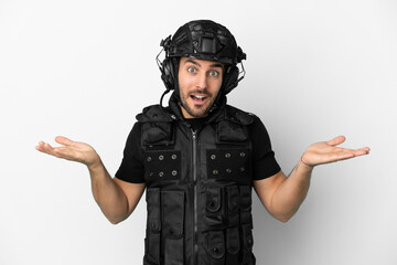 Wall Mural - Young caucasian swat isolated on white background with shocked facial expression