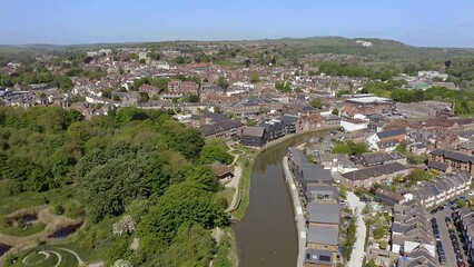 Wall Mural - The historic town of Lewes in East Sussex and the River Ouse which flows through the town and the South Downs. Aerial footage.