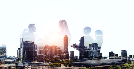 Wall Mural - Group of business people outlines with lit background