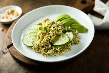 Wall Mural - Couscous with pesto, cucumber and avocado