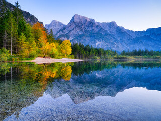 Wall Mural - mountains and reflections on the surface of the water. mountain lake and forest. landscape in the hi