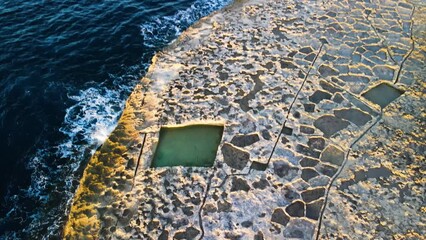 Wall Mural - Aerial sunset view of Salt Pans in Zebbug, Gozo