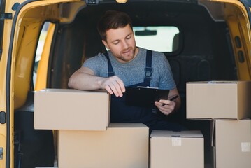 Canvas Print - young delivery man courier in uniform hold documents clipboard checking list parcel post boxes near a car for service shipment to customer, Online shopping service concepts.