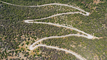 Wall Mural - Aerial drone top view photo of snake road passing over mountain