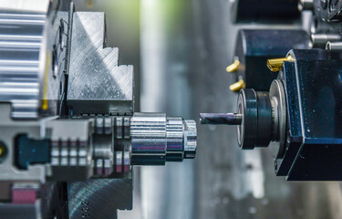 Wall Mural - cnc lathe machine cutting the metal screw thread part, the hi-technology parts manufacturing