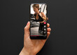 © Kaspars Grinvalds - Video with a woman working out in a gym shared on social media app viewed on a mobile phone