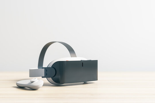 Virtual reality and metaverse concept with white and black helmet and joystick on wooden table. 3D rendering