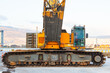 Crawler crane standing on the territory of the port of Izmir in Turkey.