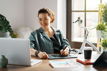 Woman is working at workshop