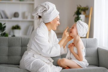 Wall Mural - mother and daughter after a bath