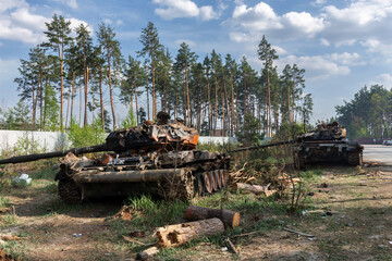 Wall Mural - BUCHA, UKRAINE 12.05.2022 Irpin, Bucha. Atrocities of the russian army in the suburbs of Kyiv. russian tank knocked out by the Ukrainian army. War of russia against Ukraine.