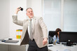 © Minerva Studio - Angry businessman throwing away his phone