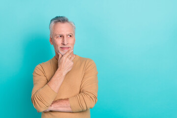 Sticker - Photo of handsome interested businessman look blank space brainstorming idea plan isolated on teal color background