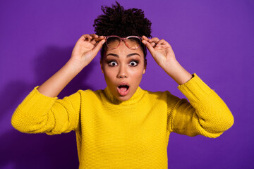 Wall Mural - Portrait of impressed pretty lady hands touch glasses open mouth isolated on purple color background