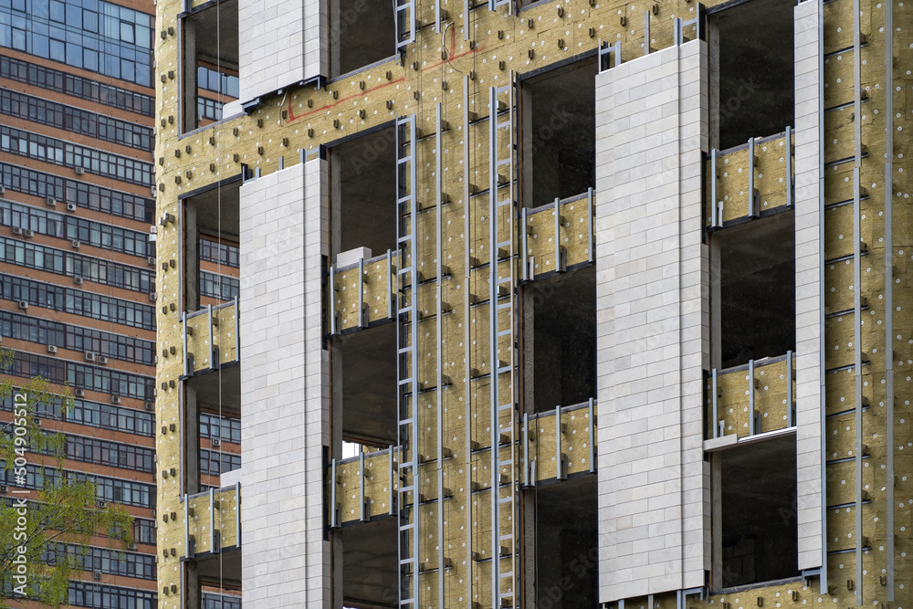 Foto de Stock Installation of external wall thermal insulation with ... - Thermal Insulation For Energy Efficiency In Apartments