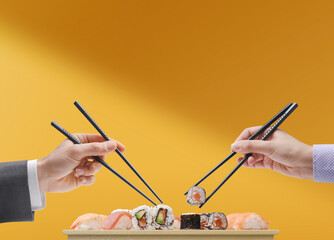 Man and woman eating sushi together