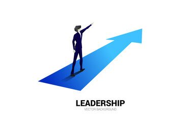 Poster - Silhouette of businessman point ahead on forwarding arrow. Concept of people ready to start career and business