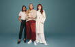 © Jacob Lund - Studio shot of three women looking at the camera