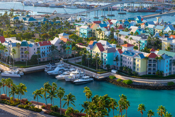 Harborside Villas aerial view at Nassau Harbour with Nassau downtown at the background, from Paradise Island, Bahamas.